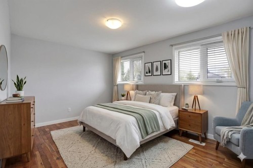 127 Woodstock Road Sw, Calgary, AB - Indoor Photo Showing Bedroom
