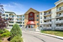 2132-700 Willowbrook Road Nw, Airdrie, AB  - Outdoor With Balcony With Facade 
