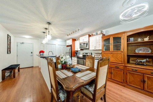 2132-700 Willowbrook Road Nw, Airdrie, AB - Indoor Photo Showing Dining Room