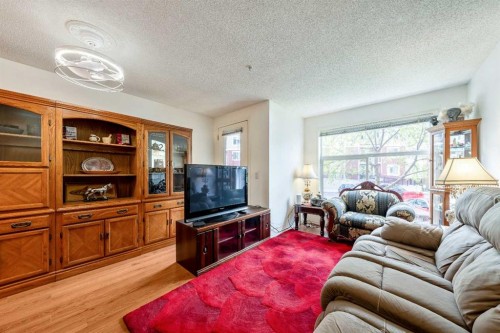 2132-700 Willowbrook Road Nw, Airdrie, AB - Indoor Photo Showing Living Room