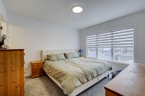 314 Midgrove Link Sw, Airdrie, AB - Indoor Photo Showing Bedroom