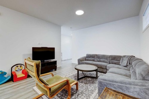 314 Midgrove Link Sw, Airdrie, AB - Indoor Photo Showing Living Room