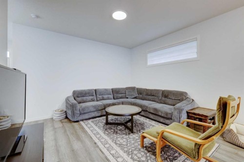314 Midgrove Link Sw, Airdrie, AB - Indoor Photo Showing Living Room