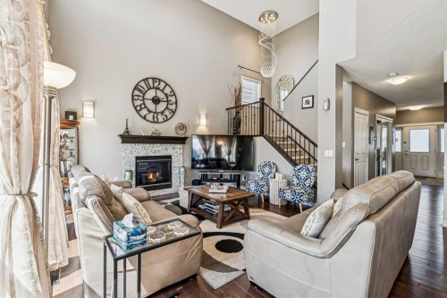 108 Seagreen Lane, Chestermere, AB - Indoor Photo Showing Living Room With Fireplace