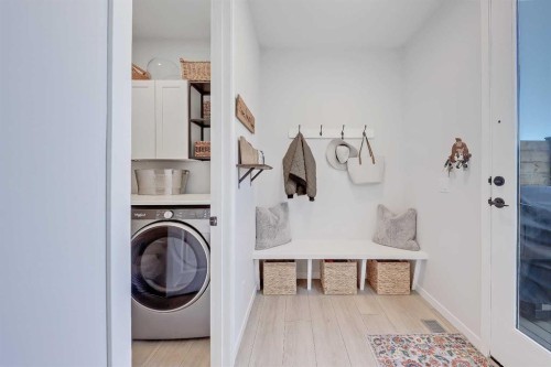 164 Setonstone Manor Se, Calgary, AB - Indoor Photo Showing Laundry Room