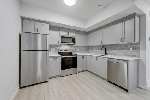 164 Setonstone Manor Se, Calgary, AB - Indoor Photo Showing Kitchen With Stainless Steel Kitchen