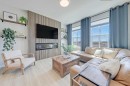 164 Setonstone Manor Se, Calgary, AB  - Indoor Photo Showing Living Room With Fireplace 