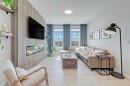 164 Setonstone Manor Se, Calgary, AB  - Indoor Photo Showing Living Room With Fireplace 