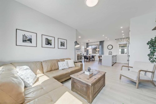 164 Setonstone Manor Se, Calgary, AB - Indoor Photo Showing Living Room