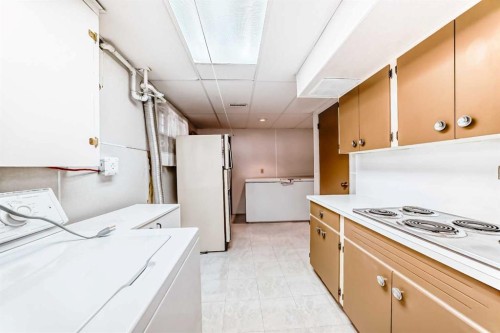 54 Fullerton Road Se, Calgary, AB - Indoor Photo Showing Laundry Room