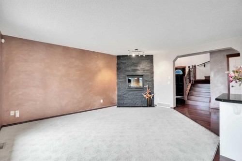161 Panamount Close Nw, Calgary, AB - Indoor With Fireplace