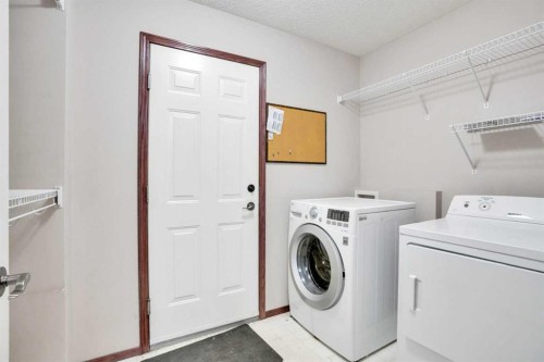 161 Panamount Close Nw, Calgary, AB - Indoor Photo Showing Laundry Room