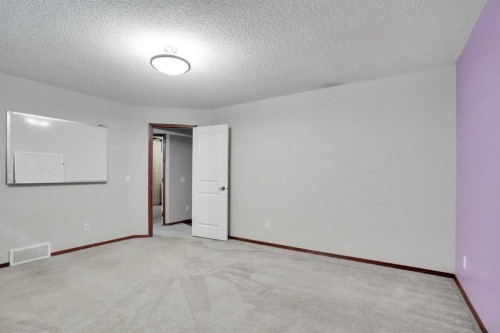 161 Panamount Close Nw, Calgary, AB - Indoor Photo Showing Other Room