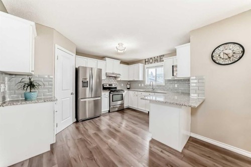 92 Covehaven Road Ne, Calgary, AB - Indoor Photo Showing Kitchen With Upgraded Kitchen