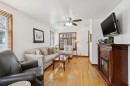 2048 26 Street Se, Calgary, AB  - Indoor Photo Showing Living Room With Fireplace 