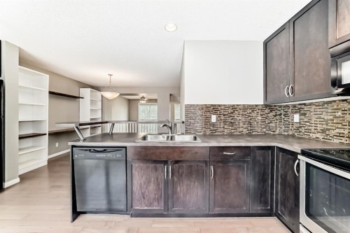 314 New Brighton Villas Se, Calgary, AB - Indoor Photo Showing Kitchen With Double Sink With Upgraded Kitchen