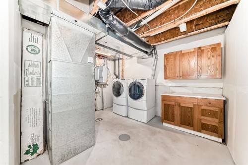 314 New Brighton Villas Se, Calgary, AB - Indoor Photo Showing Laundry Room
