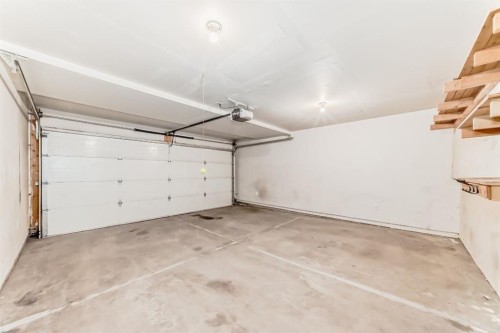 314 New Brighton Villas Se, Calgary, AB - Indoor Photo Showing Garage