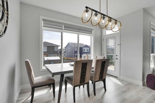 3 Rivercrest Common, Cochrane, AB - Indoor Photo Showing Dining Room