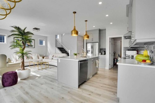 3 Rivercrest Common, Cochrane, AB - Indoor Photo Showing Kitchen With Upgraded Kitchen