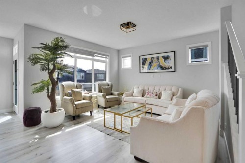 3 Rivercrest Common, Cochrane, AB - Indoor Photo Showing Living Room