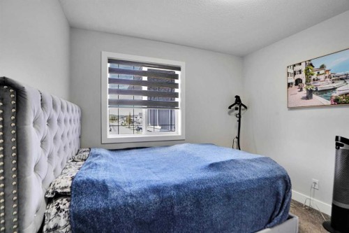 3 Rivercrest Common, Cochrane, AB - Indoor Photo Showing Bedroom