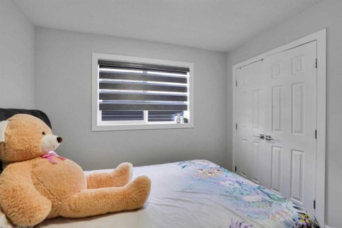 3 Rivercrest Common, Cochrane, AB - Indoor Photo Showing Bedroom