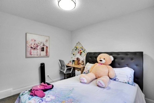 3 Rivercrest Common, Cochrane, AB - Indoor Photo Showing Bedroom