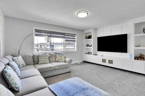 3 Rivercrest Common, Cochrane, AB - Indoor Photo Showing Living Room