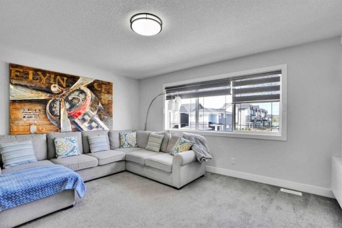 3 Rivercrest Common, Cochrane, AB - Indoor Photo Showing Living Room