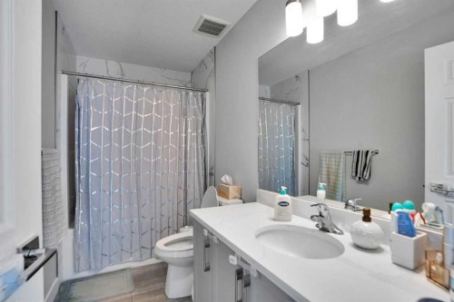 3 Rivercrest Common, Cochrane, AB - Indoor Photo Showing Bathroom