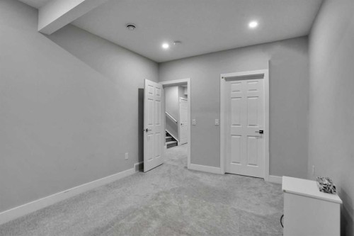 3 Rivercrest Common, Cochrane, AB - Indoor Photo Showing Other Room
