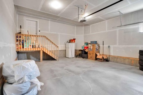 3 Rivercrest Common, Cochrane, AB - Indoor Photo Showing Garage