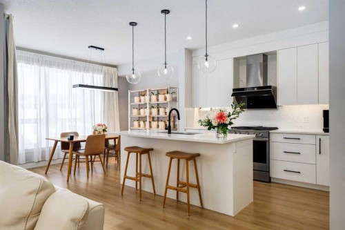 237-7820 Spring Willow Drive Sw, Calgary, AB - Indoor Photo Showing Kitchen With Upgraded Kitchen