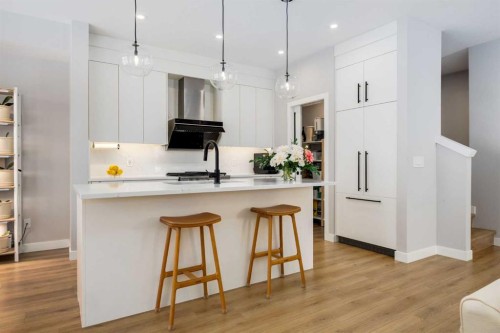 237-7820 Spring Willow Drive Sw, Calgary, AB - Indoor Photo Showing Kitchen With Upgraded Kitchen