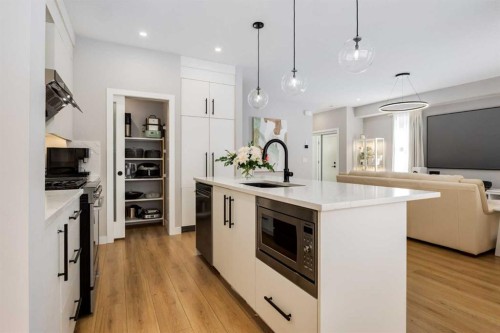 237-7820 Spring Willow Drive Sw, Calgary, AB - Indoor Photo Showing Kitchen With Upgraded Kitchen