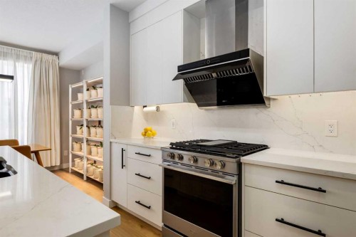 237-7820 Spring Willow Drive Sw, Calgary, AB - Indoor Photo Showing Kitchen With Upgraded Kitchen