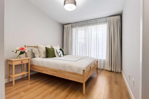 237-7820 Spring Willow Drive Sw, Calgary, AB - Indoor Photo Showing Bedroom