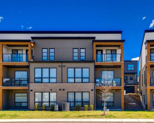237-7820 Spring Willow Drive Sw, Calgary, AB - Outdoor With Balcony With Facade