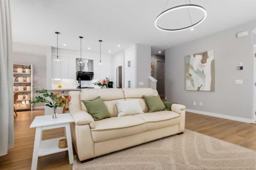 237-7820 Spring Willow Drive Sw, Calgary, AB - Indoor Photo Showing Living Room