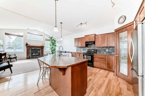124 Lavender Way, Chestermere, AB - Indoor Photo Showing Kitchen With Stainless Steel Kitchen With Double Sink
