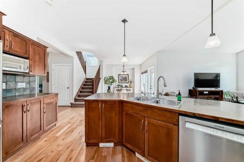 124 Lavender Way, Chestermere, AB - Indoor Photo Showing Kitchen With Double Sink