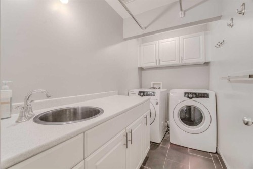 100 Royal Birch Crescent Nw, Calgary, AB - Indoor Photo Showing Laundry Room