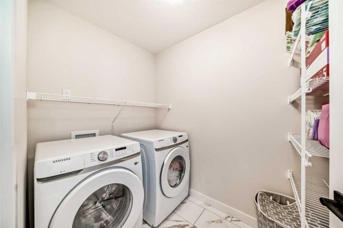10 Verity Landing Sw, Calgary, AB - Indoor Photo Showing Laundry Room
