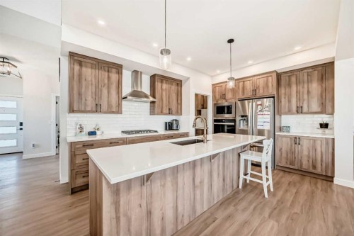 10 Verity Landing Sw, Calgary, AB - Indoor Photo Showing Kitchen With Stainless Steel Kitchen With Upgraded Kitchen