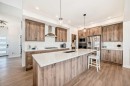 10 Verity Landing Sw, Calgary, AB  - Indoor Photo Showing Kitchen With Stainless Steel Kitchen With Upgraded Kitchen 