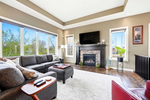 45 Cranbrook Heights Se, Calgary, AB - Indoor Photo Showing Living Room With Fireplace