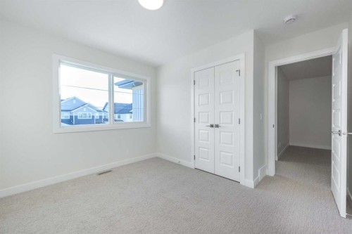 122 Sandpiper Bend, Chestermere, AB - Indoor Photo Showing Other Room
