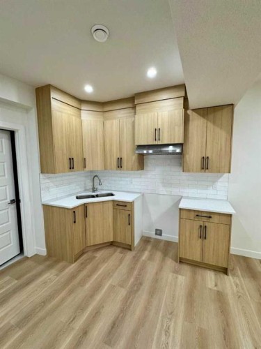 122 Sandpiper Bend, Chestermere, AB - Indoor Photo Showing Kitchen With Double Sink