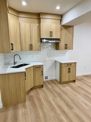 122 Sandpiper Bend, Chestermere, AB - Indoor Photo Showing Kitchen With Double Sink
